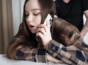 Fucking my stepsister while she's on the phone.