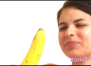 How-to: young brunette cooky teaches using a banana